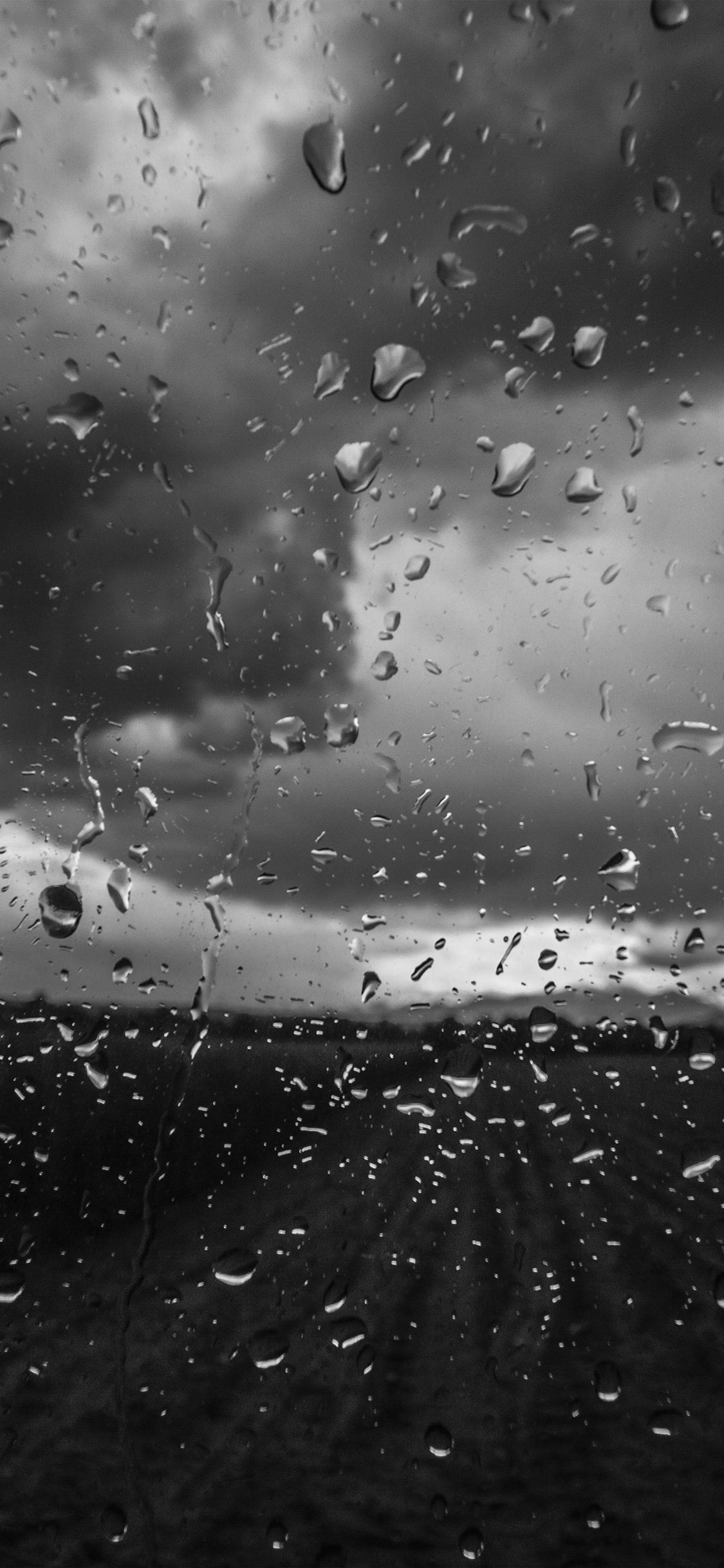 1125x2436 mv92-rainy-window-nature-water-drop-road-dark-bw-wallpaper