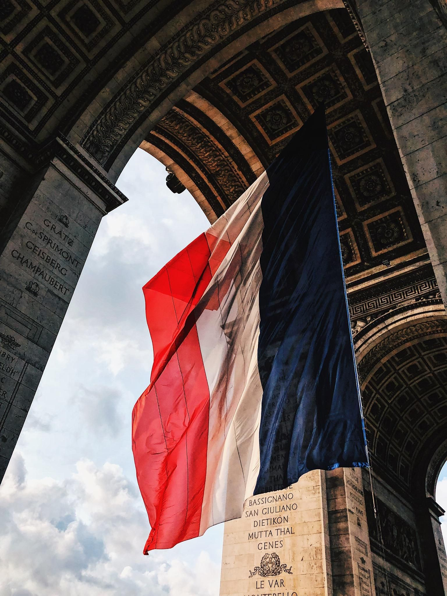 1536x2048 Arc de Triomphe in Paris France. With the flag of France | France flag, France wallpaper, Paris city