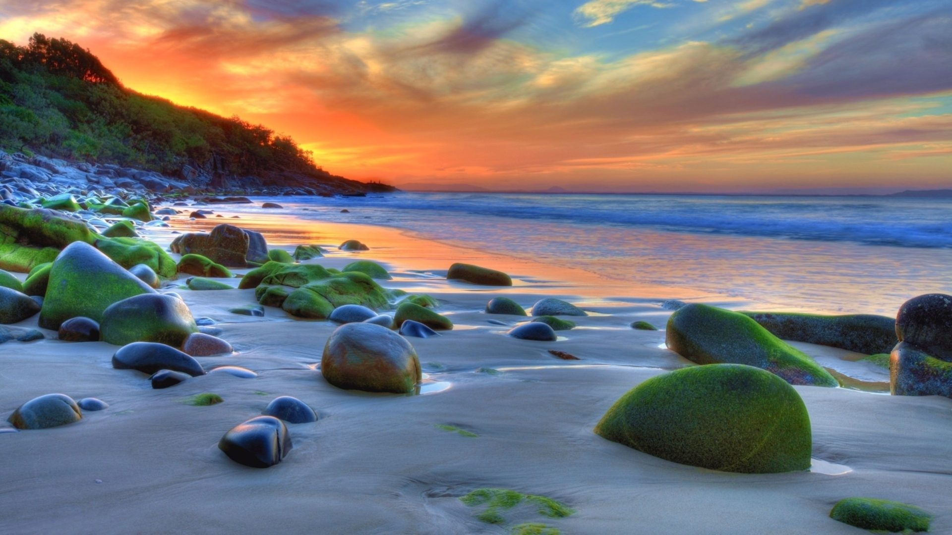 1920x1080 Sunset Ocean Sandy Beach Rocks Green Movi Water Nature KDE Store