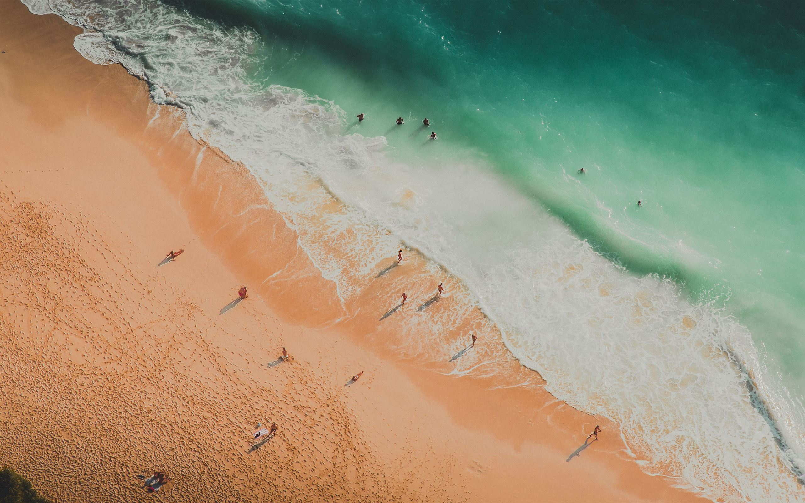2560x1600 aerial photography of people at the beach MacBook Air Wallpaper Download |