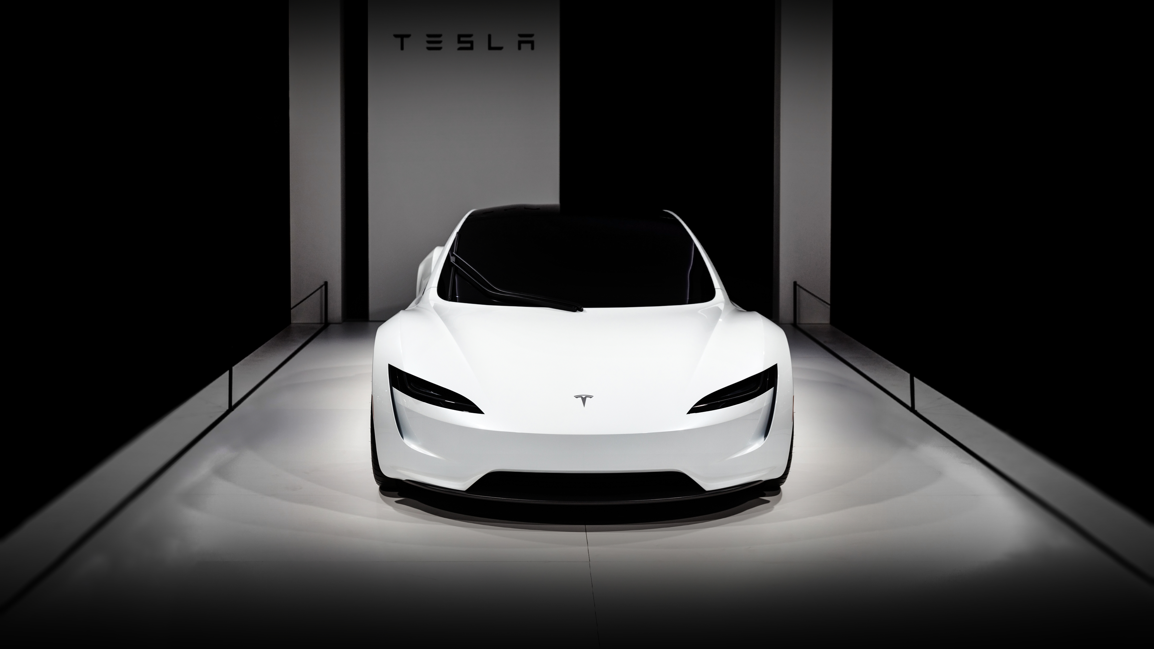 3840x2160 Wanted a Tesla Roadster wallpaper so I made this from a Grand Basel photo. In 4k, enjoy. : r/teslamotors