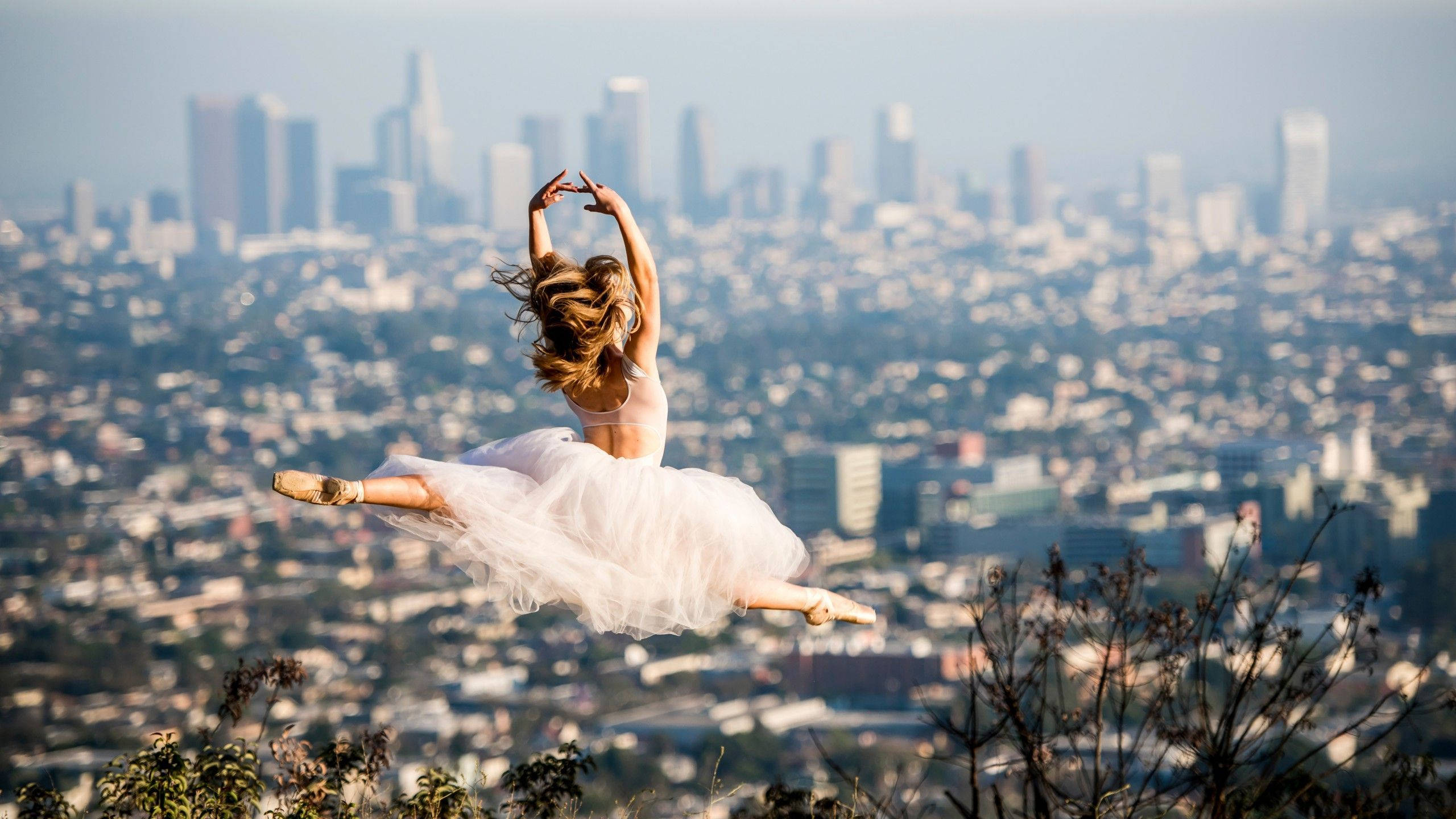 2560x1440 Download Ballet Dancer With City Overview Wallpaper