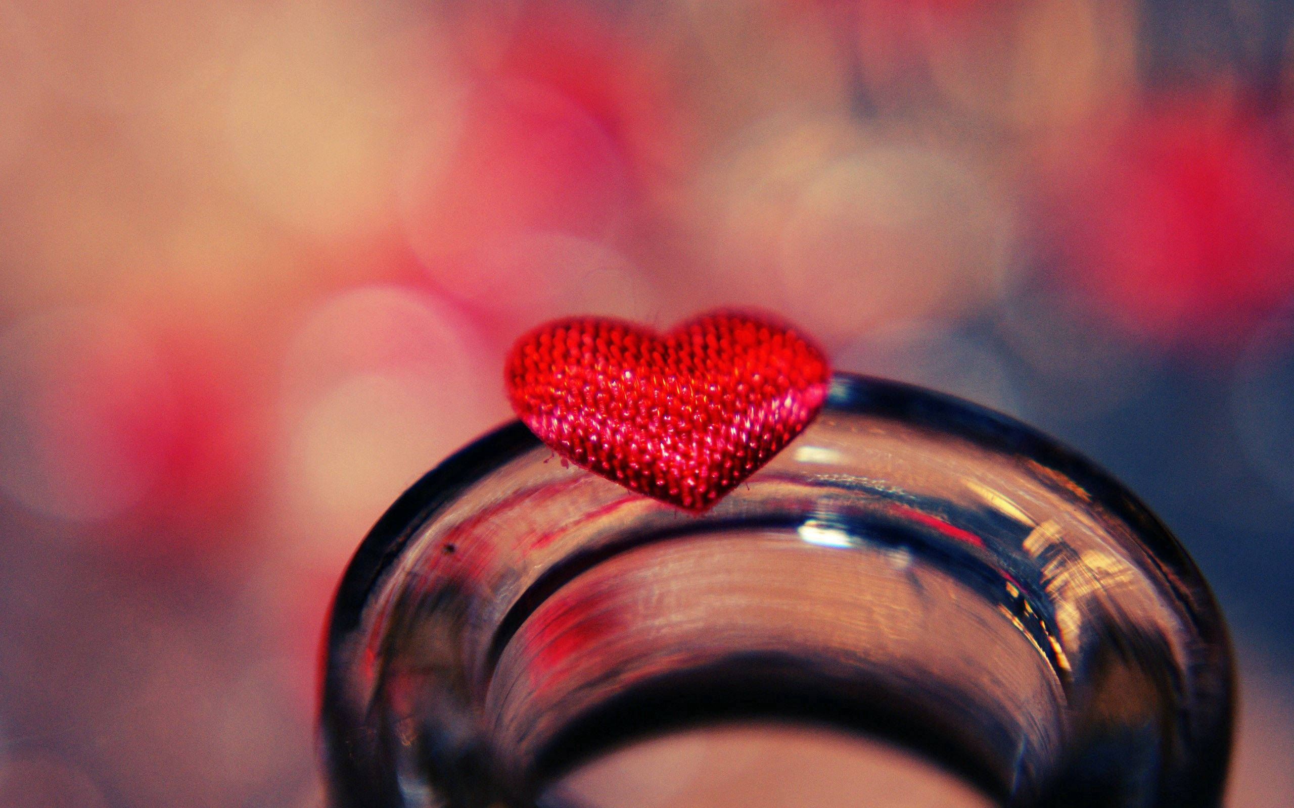 2560x1600 Download Tiny Red Heart On Bottle Wallpaper