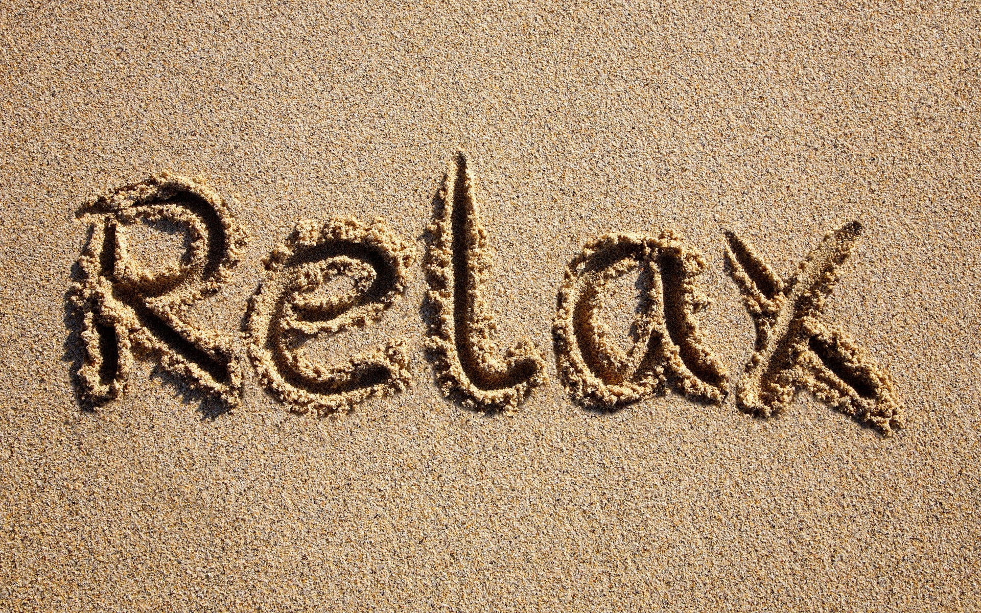 1920x1200 Relax text on beach sand HD wallpaper