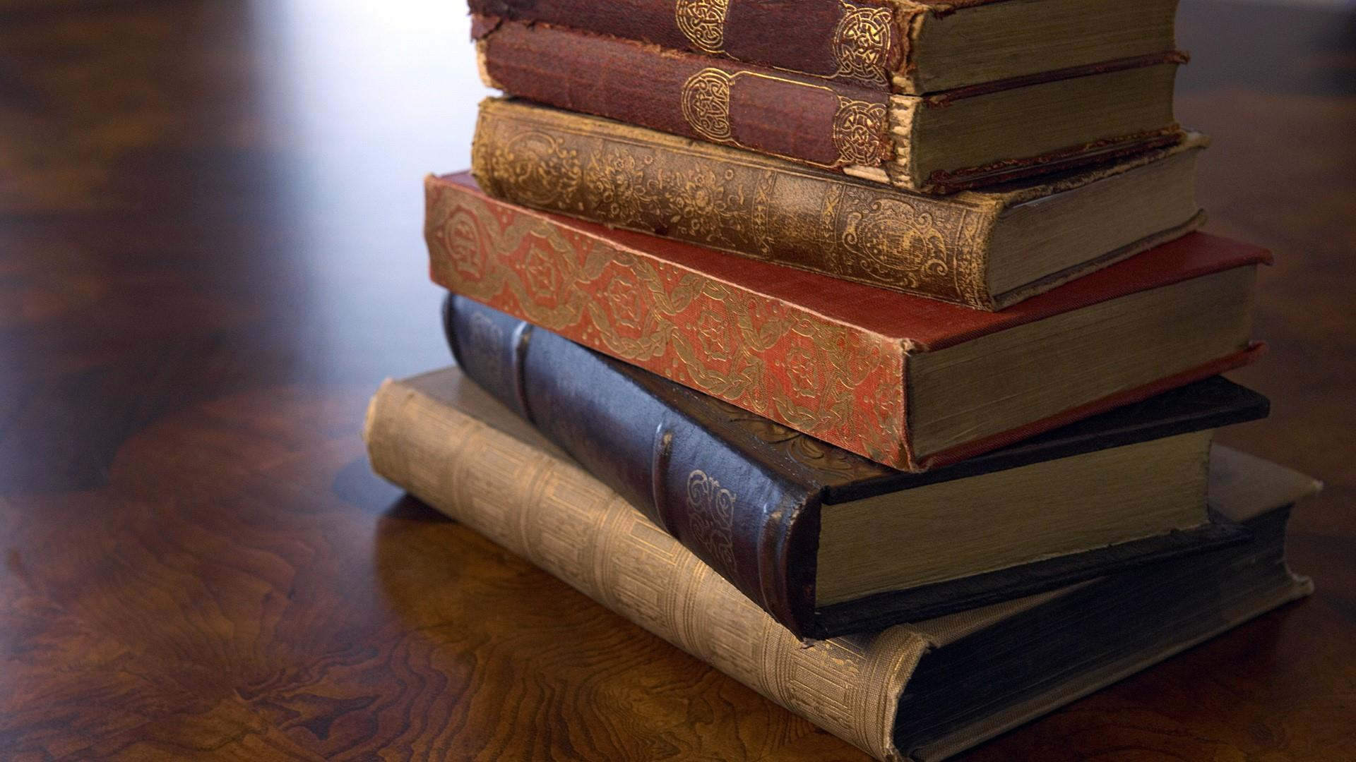 1920x1080 Old books on the table wallpaper backiee