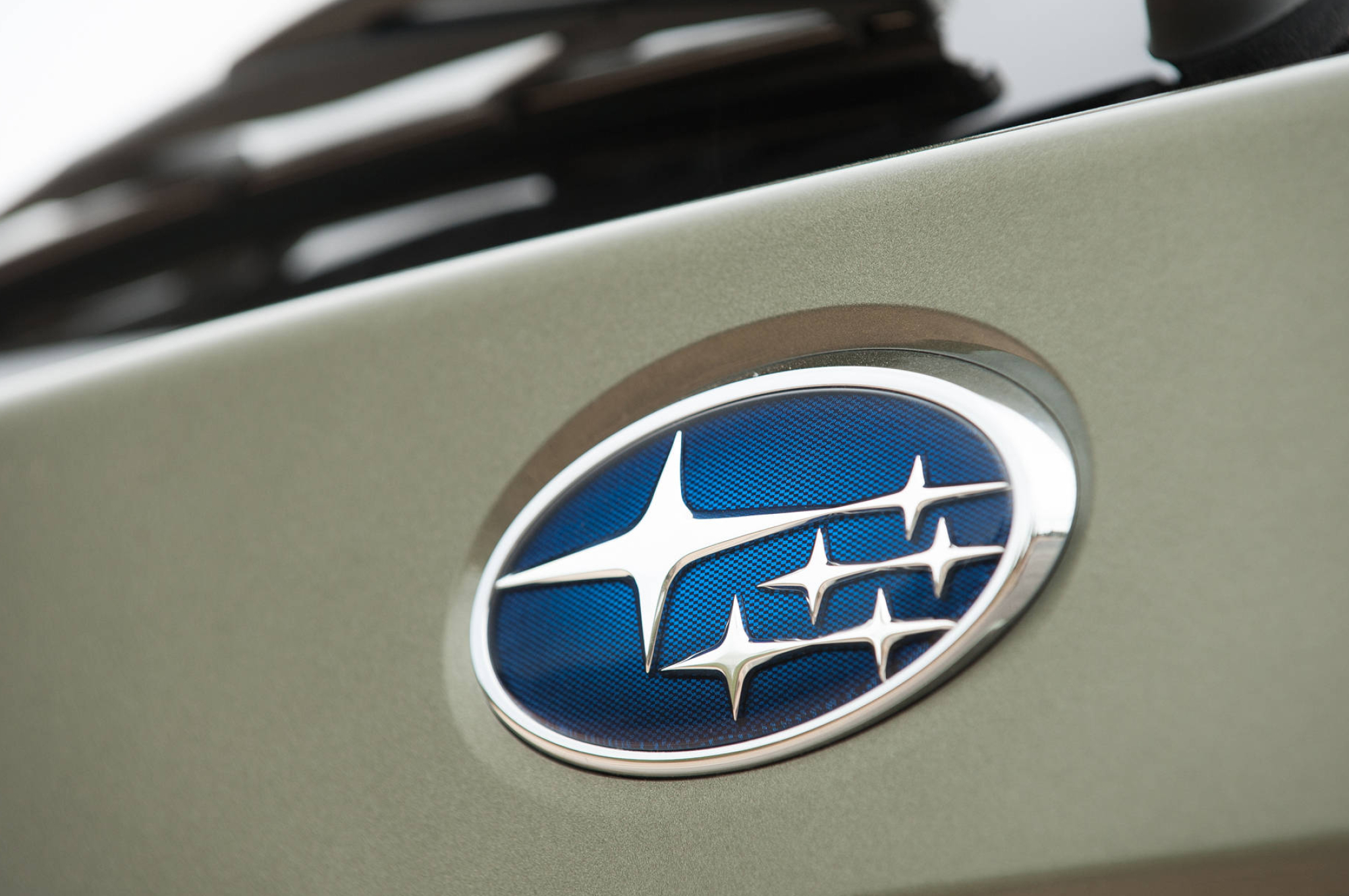 2048x1360 Download Subaru Logo On Gray Car Wallpaper