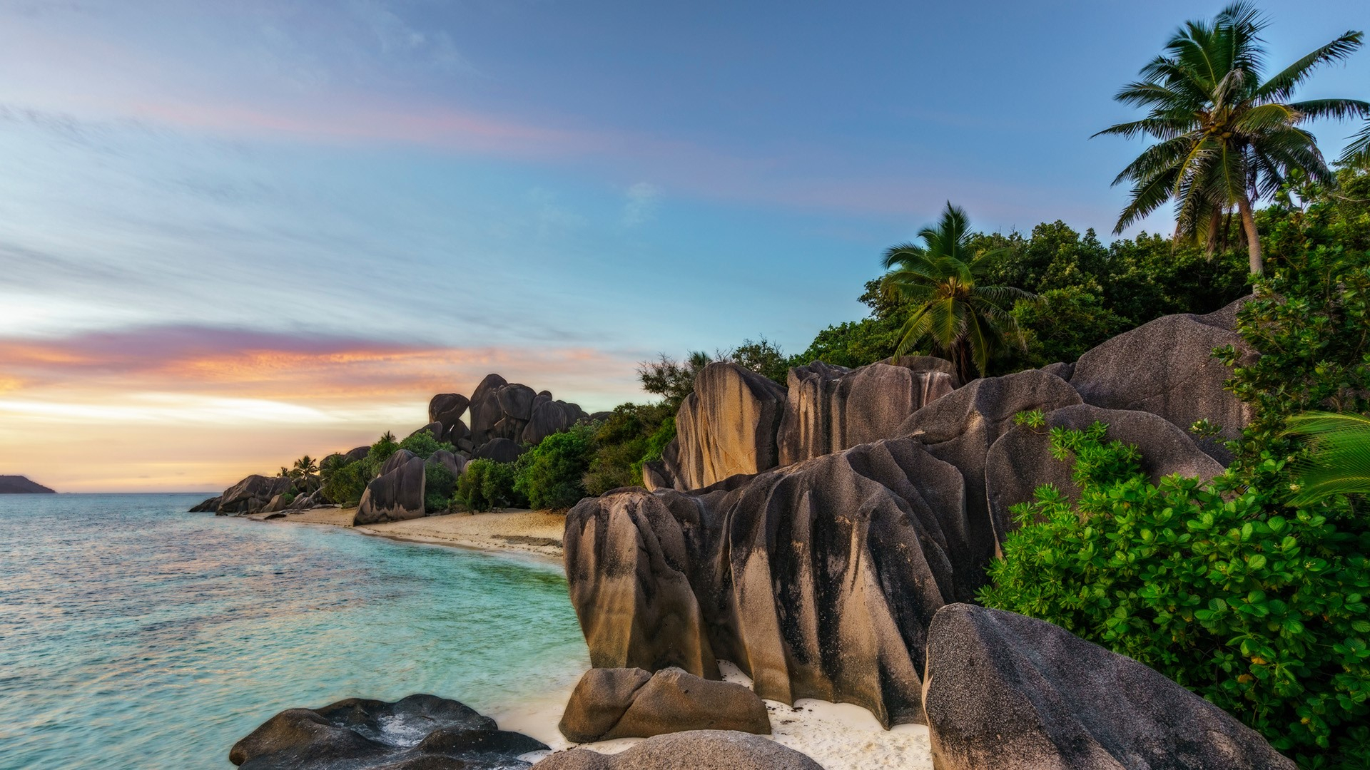 1920x1080 Sunset over rocks at beach Anse Source d'Argent, La Digue Island, Seychelles | Windows 10 Spotlight Images